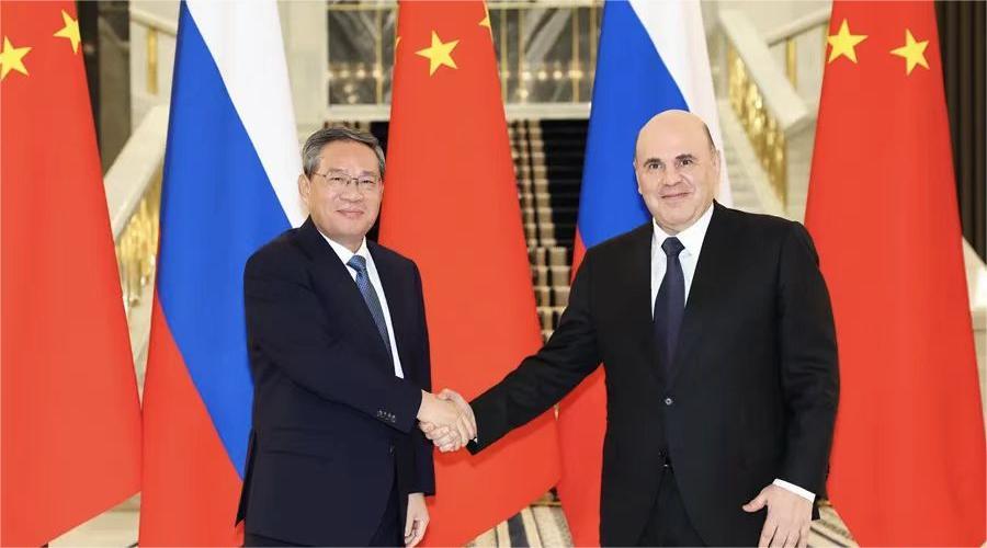 李强会见俄罗斯总理米舒斯京